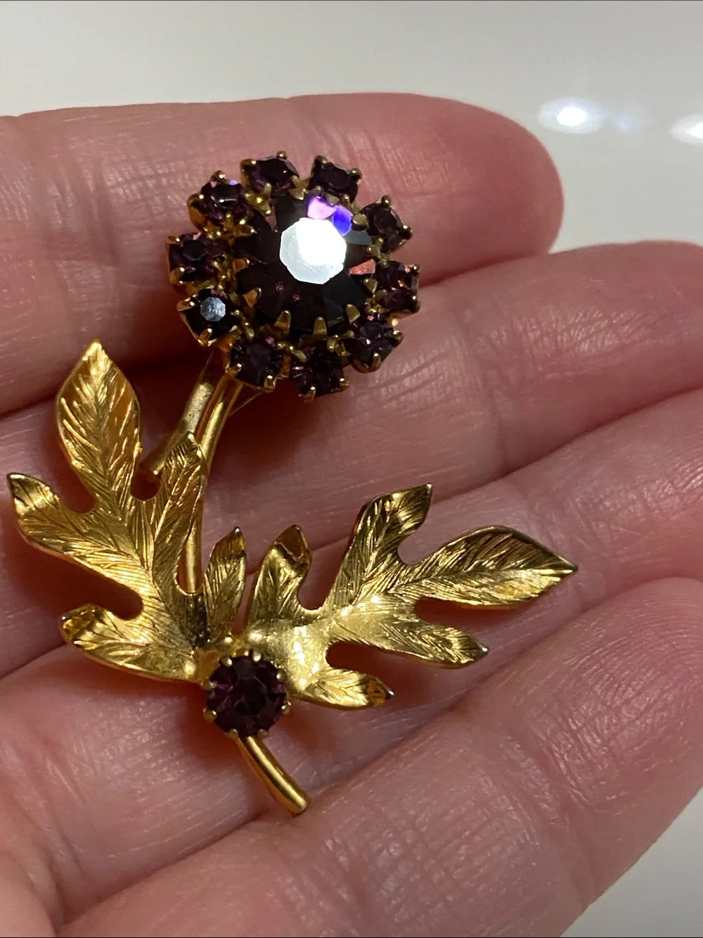 VTG Gold-Tone Floral Brooch with Purple Rhinestones